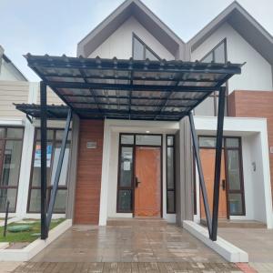 kanopi bajaringan atap spandek polos + cat rangka